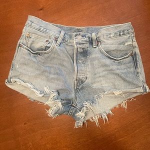 Levi’s 501 light wash denim high waisted cut off shorts
